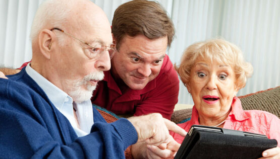 Family Looking At Virtual Tour on a Tablet created by DayStar Graphics.